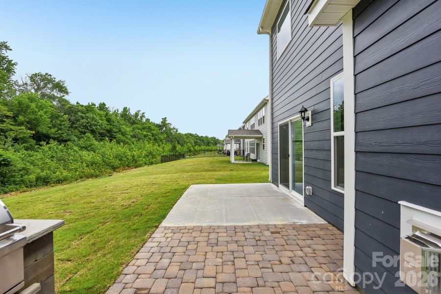 Exterior details and patio area of a home in Sanctuary at Southgate, Indian Trail (Image 3). Exterior details and patio area of a home in Sanctuary at Southgate, Indian Trail (Image 3).