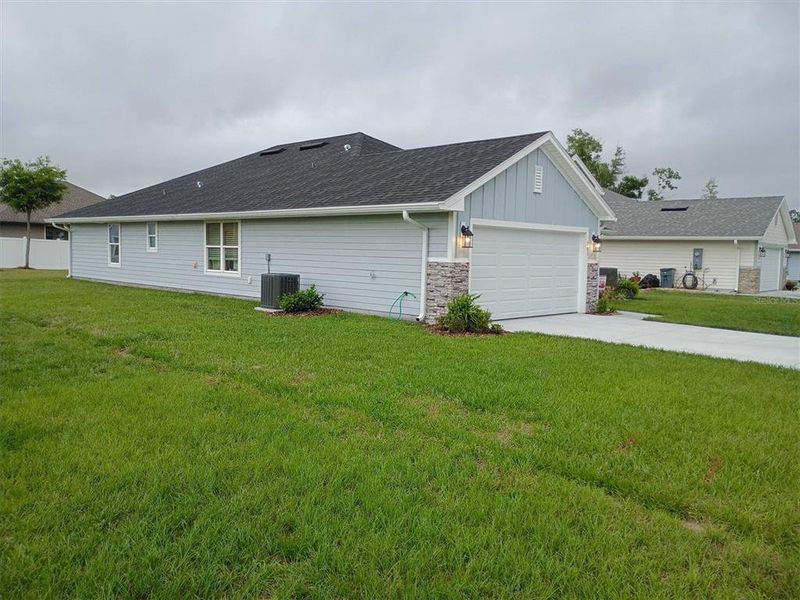 Front exterior of a new home in , Lake City, FL, highlighting curb appeal (Image 27).