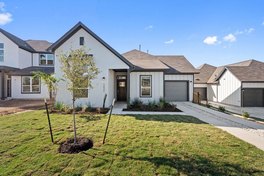Front exterior of a new home in Loyola, Austin, TX, highlighting curb appeal (Image 3).