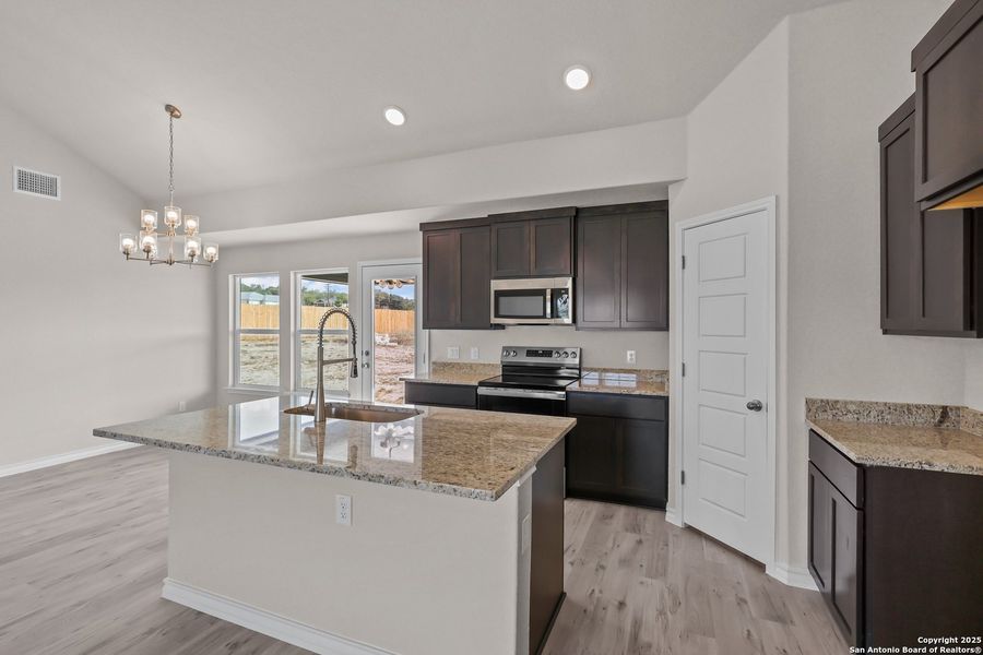 Furnished interior view inside a new home in , Poteet (Image 13).