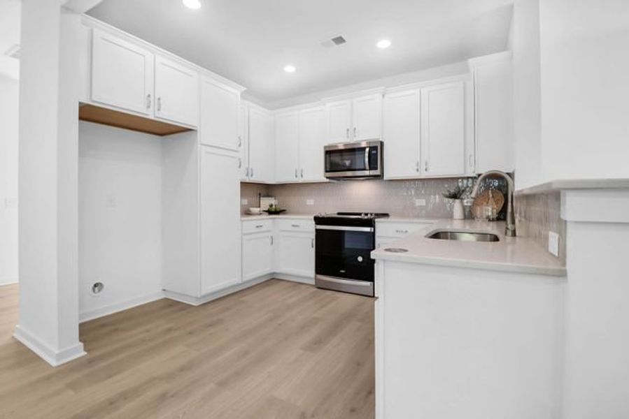 Representative furnished interior of a home built from the Kane by True Homes in Harpers Landing, Walkertown (Image 2).