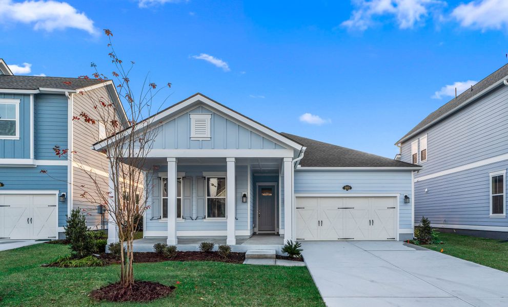 Front exterior of a new home in Beach View at Grande Dunes, Myrtle Beach, SC, highlighting curb appeal (Image 1).