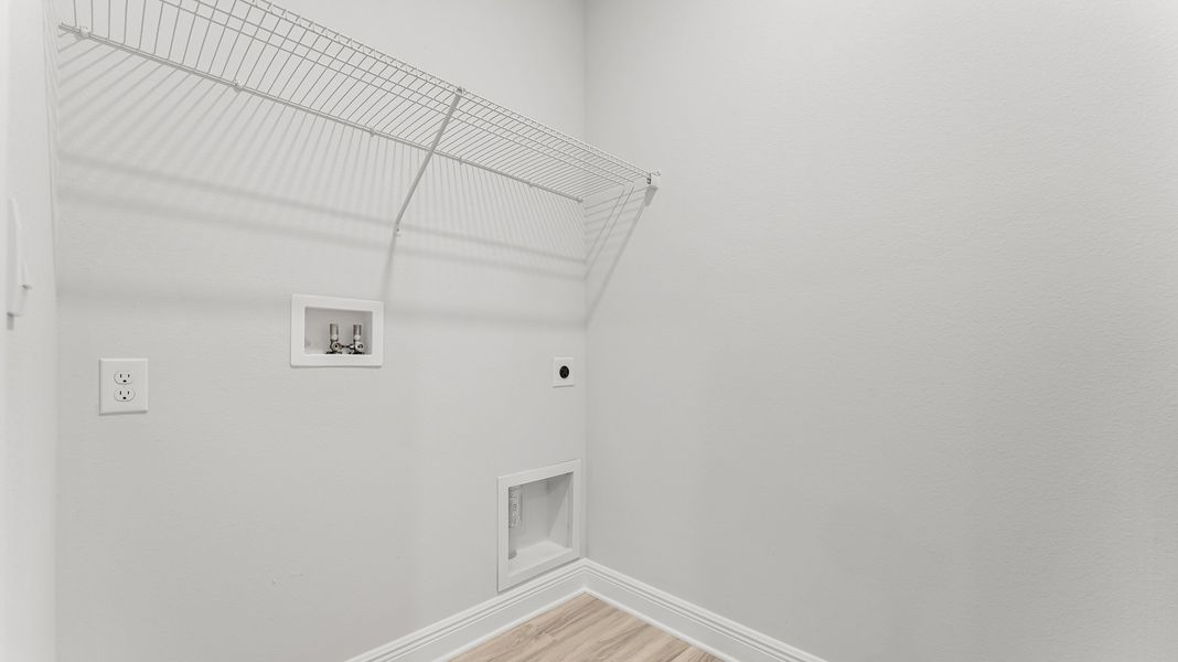 Representative unfurnished interior of a home built from the The Rhett by D.R. Horton in Pine Creek and Heron Walk, Port St. Joe (Image 26).