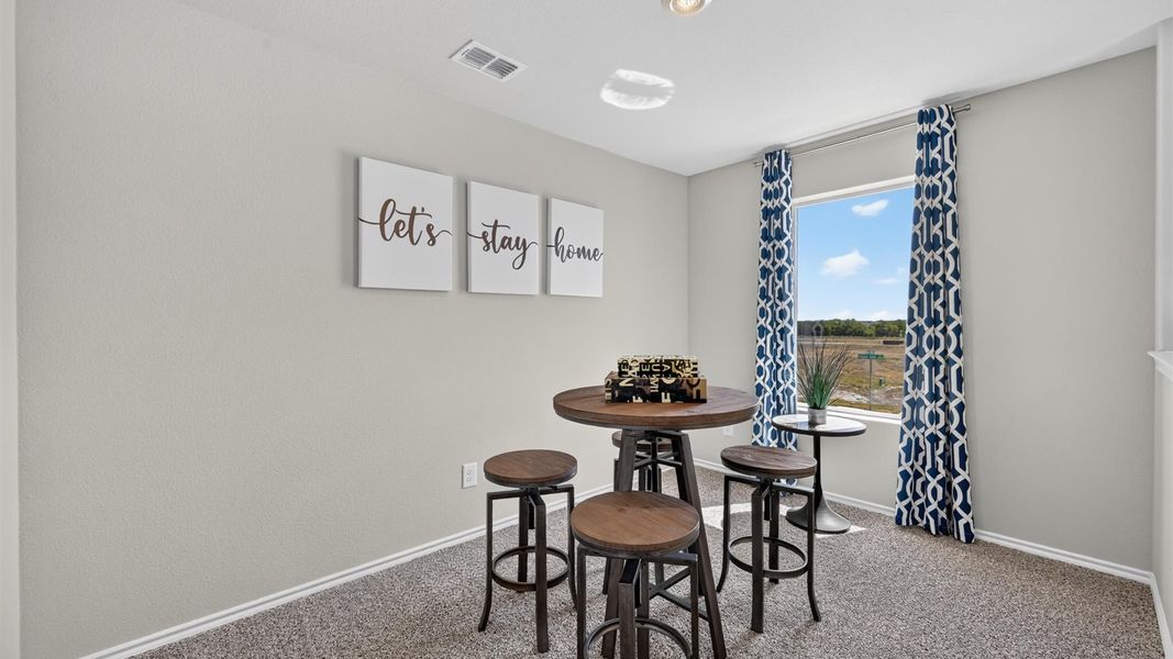 Representative furnished interior of a home built from the Callahan by D.R. Horton in Sunnycreek, Crowley (Image 30).