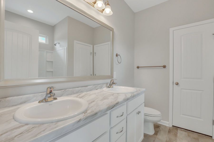 Representative furnished interior of a home built from the The Basswood by RTS Homes in Grand Reserve, Hinesville (Image 10). Representative furnished interior of a home built from the The Basswood by RTS Homes in Grand Reserve, Hinesville (Image 10).