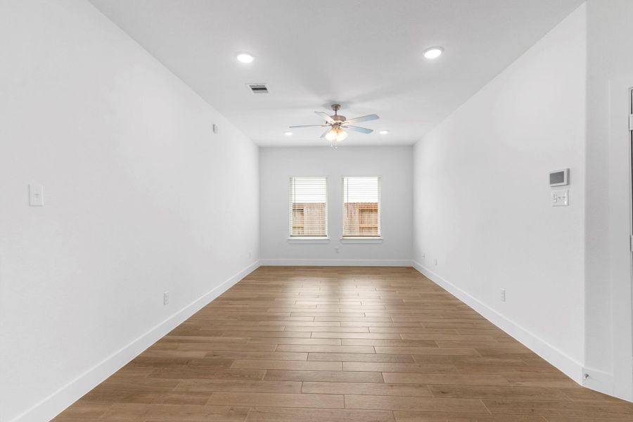 Enjoy how the large family area has a wall of windows and flows gently into the casual dining and the gourmet kitchen.