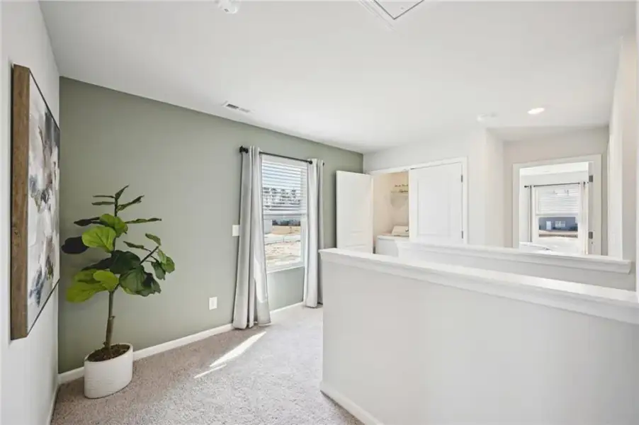 Furnished interior view inside a new home in Cash's Crossing, Ellenwood (Image 10).
