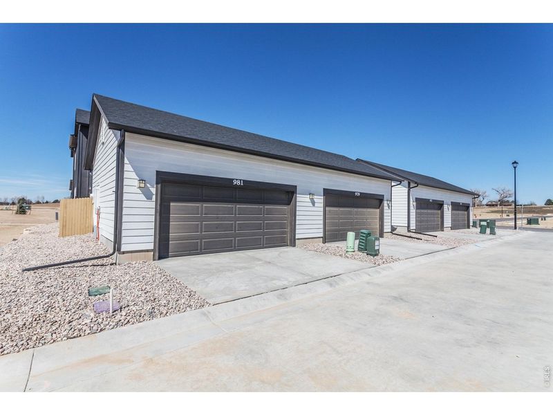 Exterior details and patio area of a home in Prairie Song Story Collection - Single Family Homes, Windsor (Image 3).