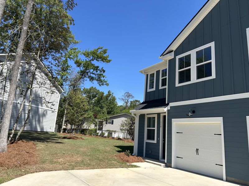 Front exterior of a new home in , Summerville, SC, highlighting curb appeal (Image 20).