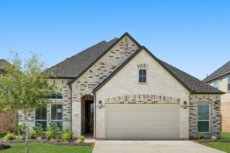 Front exterior of a new home in Briarwood Crossing, Rosenberg, TX, highlighting curb appeal (Image 15). Front exterior of a new home in Briarwood Crossing, Rosenberg, TX, highlighting curb appeal (Image 15).