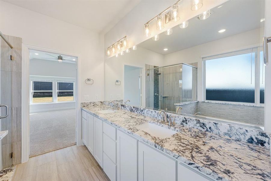 Furnished interior view inside a new home in Union Park Classic 55, Little Elm (Image 7). Furnished interior view inside a new home in Union Park Classic 55, Little Elm (Image 7).