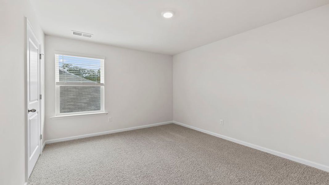 Spacious, unfurnished interior of a new home in Lakestone, Woodruff (Image 30).