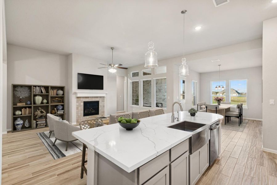 Kitchen overlooks great room (*Photo not of actual home and used for illustration purposes only.) Kitchen overlooks great room (*Photo not of actual home and used for illustration purposes only.)