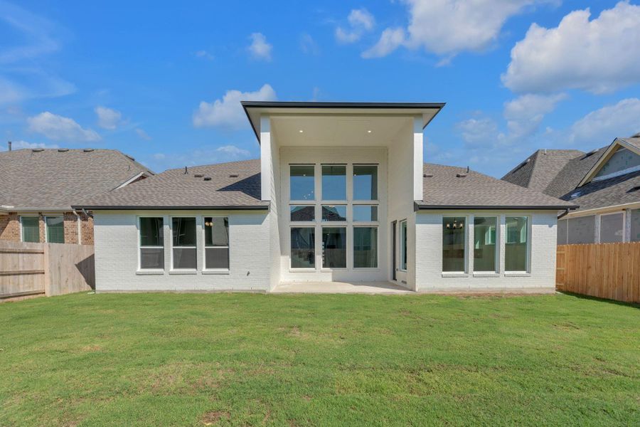 Front exterior of a new home in Flora - 60', Hutto, TX, highlighting curb appeal (Image 21).