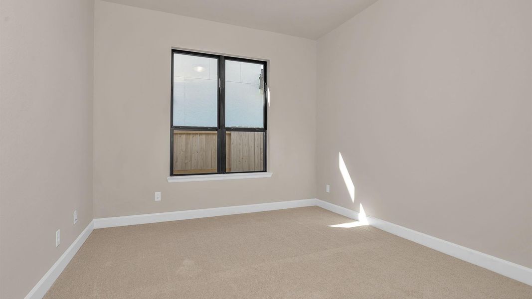 Spacious, unfurnished interior of a new home in Sienna, Missouri City (Image 9).