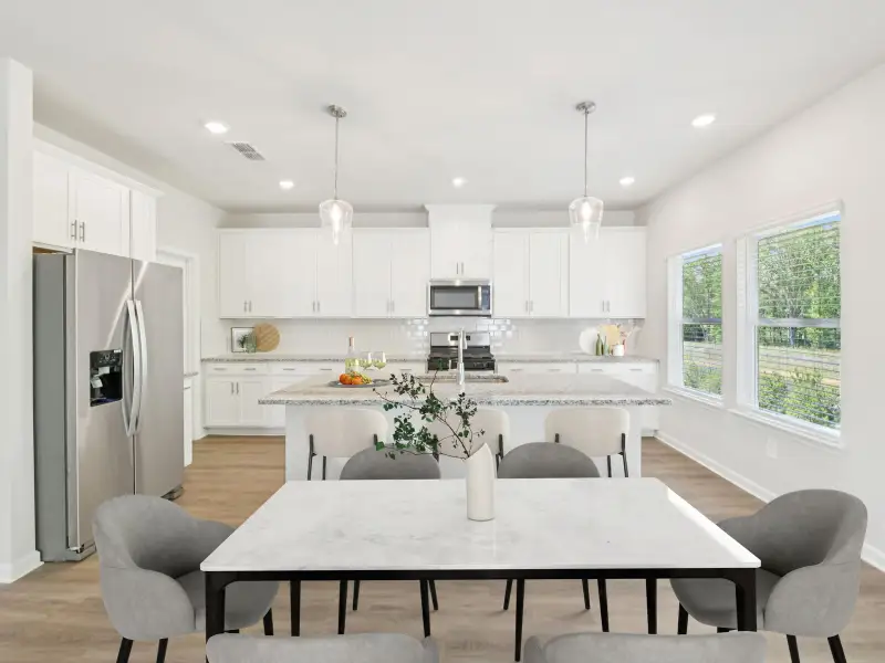 Furnished interior view inside a new home in Vines at Mill Creek - Estate Series, Braselton (Image 5).
