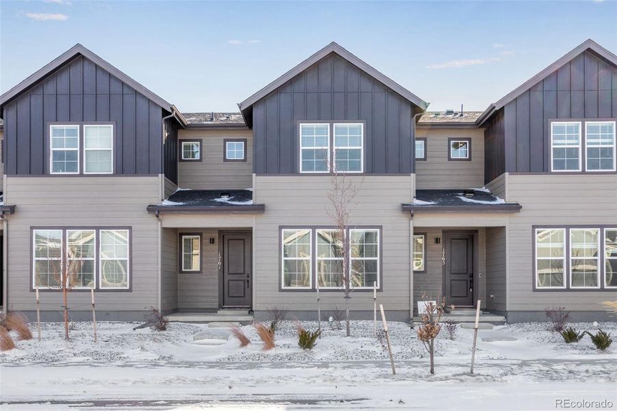 Front exterior of a new home in Westside Crossing, Berthoud, CO, highlighting curb appeal (Image 23).