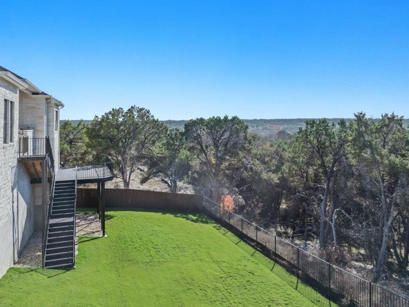 Exterior details and patio area of a home in Riverstone, Georgetown (Image 19).