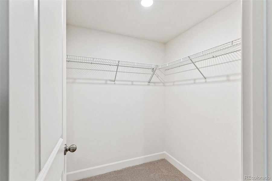 Spacious, unfurnished interior of a new home in Sky Ranch Villas, Watkins (Image 28).