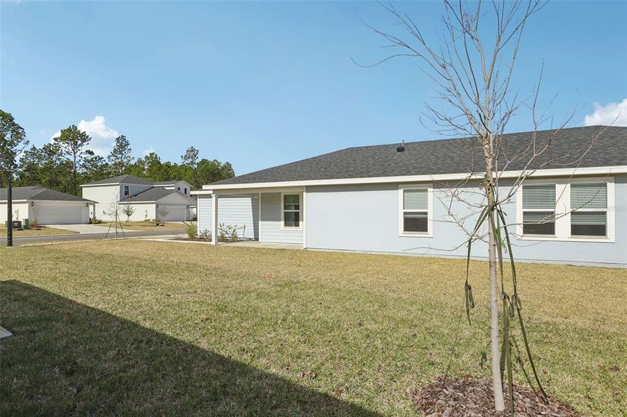 Exterior details and patio area of a home in Flagler Village - Classic Series, Palm Coast (Image 3).