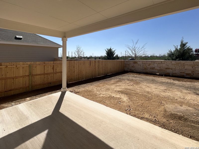 Exterior details and patio area of a home in Hennersby Hollow, San Antonio (Image 17).