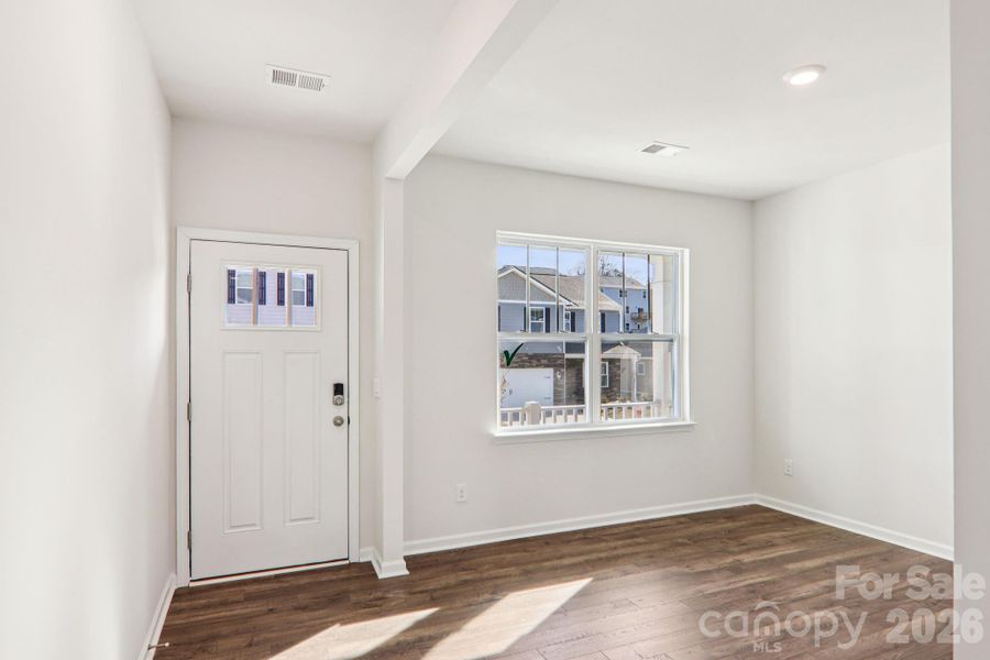 Spacious, unfurnished interior of a new home in Rydele Heights, Asheville (Image 25).