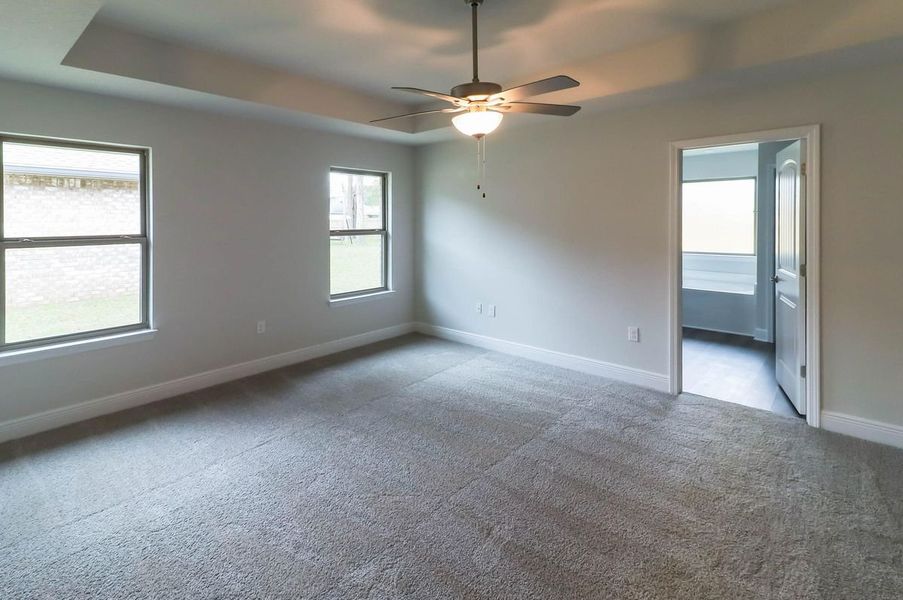 Representative unfurnished interior of a home built from the Plan 3044 by Adams Homes in Cedar Creek at Deerpoint Lake, Panama City (Image 20).