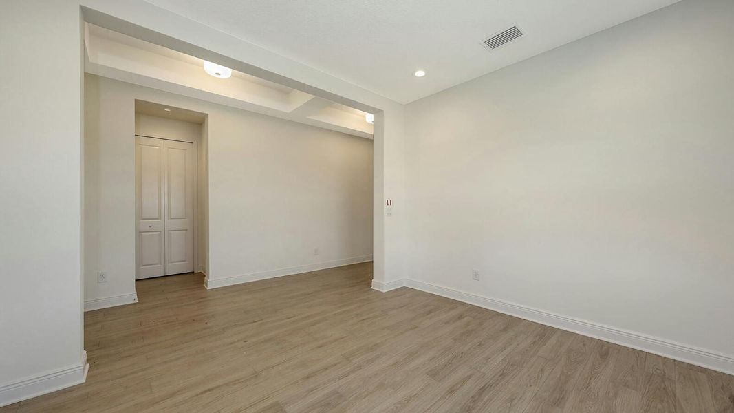 Spacious, unfurnished interior of a new home in Palm Grove Real Estate and Homes for Sale in Lakewood Ranch, FL - Neal Communities, Lakewood Ranch (Image 28).
