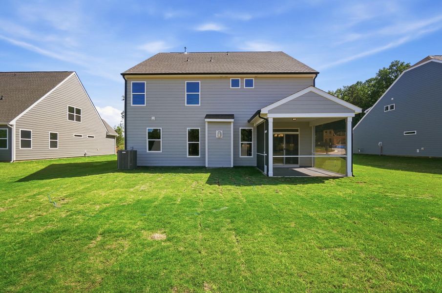 Exterior details and patio area of a home in Enclave at Riverdale, Huntersville (Image 20).