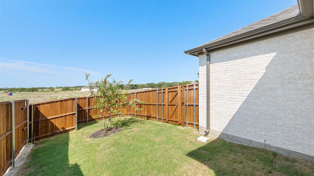 Front exterior of a new home in The Heights At Uptown Celina 45', Celina, TX, highlighting curb appeal (Image 2). Front exterior of a new home in The Heights At Uptown Celina 45', Celina, TX, highlighting curb appeal (Image 2).