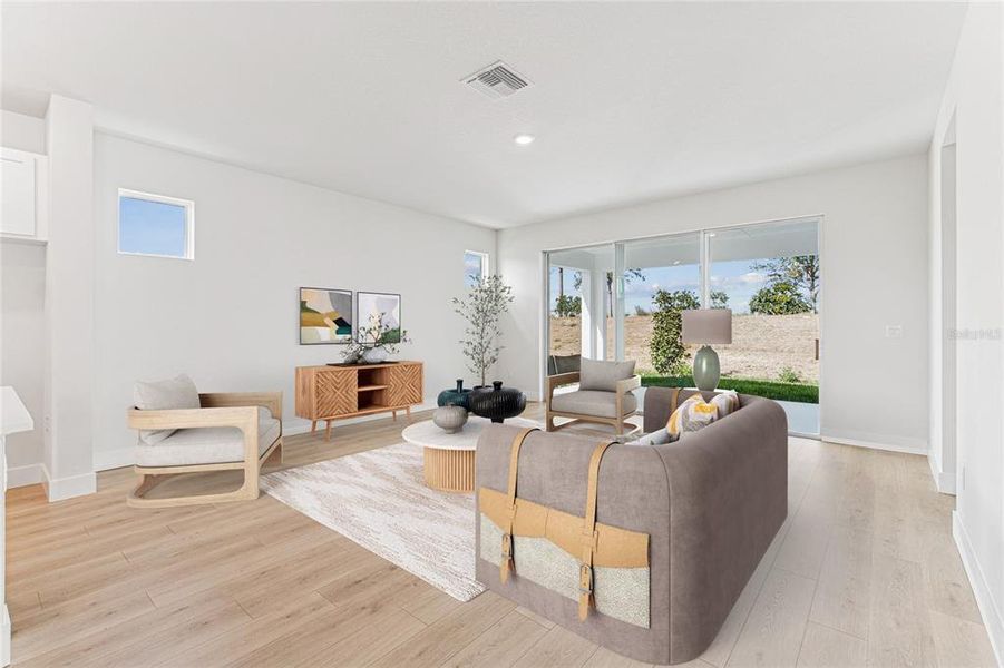 Furnished interior view inside a new home in North River Ranch - Cottage Series, Parrish (Image 12).