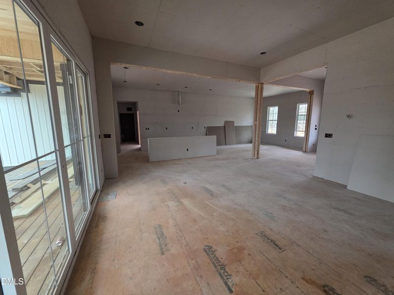 Living room view of kitchen and dining