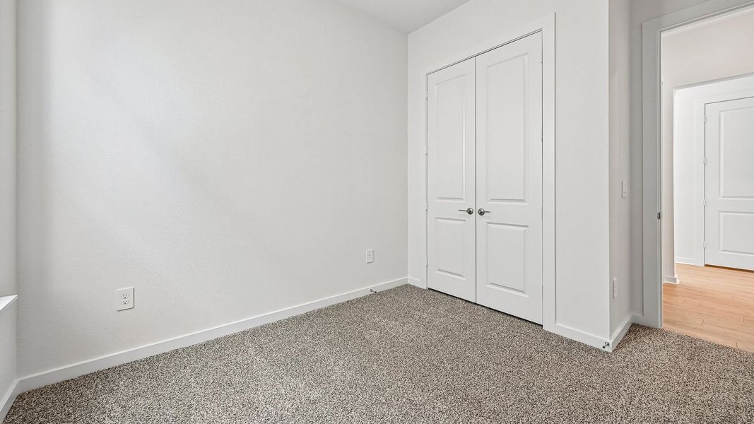 Spacious, unfurnished interior of a new home in The Enclave at Bar W Ranch, Leander (Image 37).
