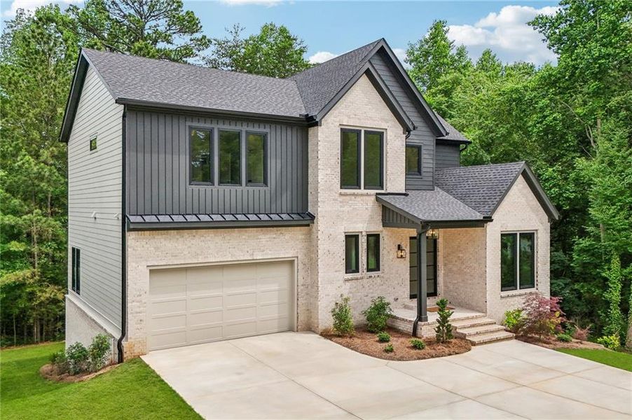 Front exterior of a new home in , Cumming, GA, highlighting curb appeal (Image 35).