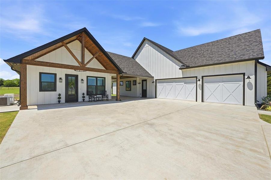 Front exterior of a new home in , Savoy, TX, highlighting curb appeal (Image 21).