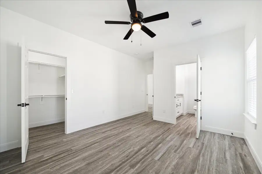 Spacious, unfurnished interior of a new home in , Wharton (Image 8).