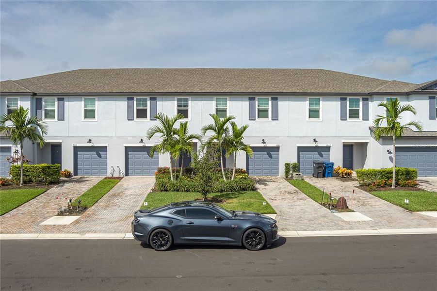 Front exterior of a new home in , Palmetto, FL, highlighting curb appeal (Image 21).