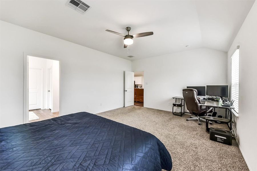 Furnished interior view inside a new home in Sunterra, Katy (Image 24).