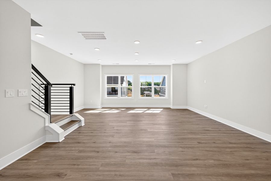 Representative unfurnished interior of a home built from the Atlas Interior Unit by Baker Residential in Atwater Station - Midtown Collection, Fuquay Varina (Image 25).