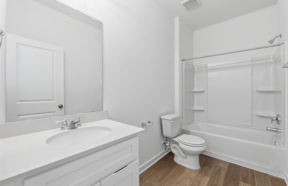 Furnished interior view inside a new home in Sunfield, Buda (Image 11).