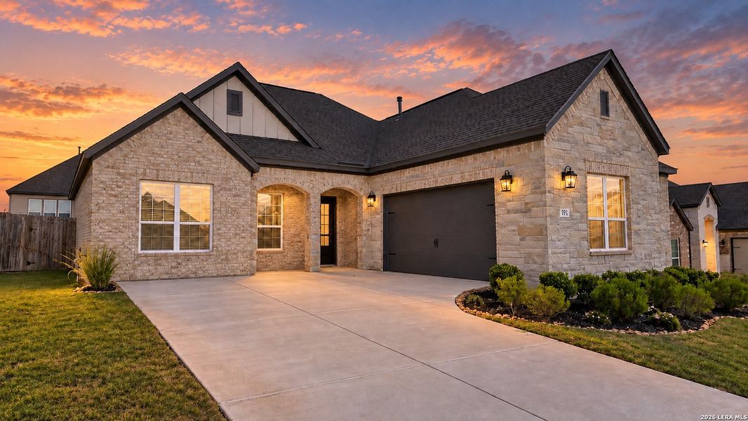 Front exterior of a new home in Potranco West, Castroville, TX, highlighting curb appeal (Image 19).