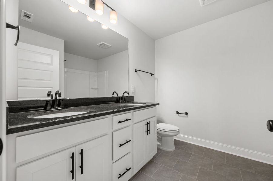 Front exterior of a new home in Saddlebrook, Murfreesboro, TN, highlighting curb appeal (Image 23).