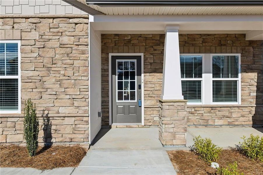 Exterior details and patio area of a home in River Pointe, Monroe (Image 27).