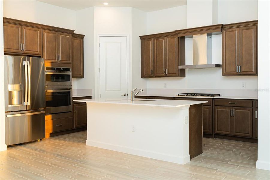 Furnished interior view inside a new home in Tesoro Club, Port St. Lucie (Image 9).