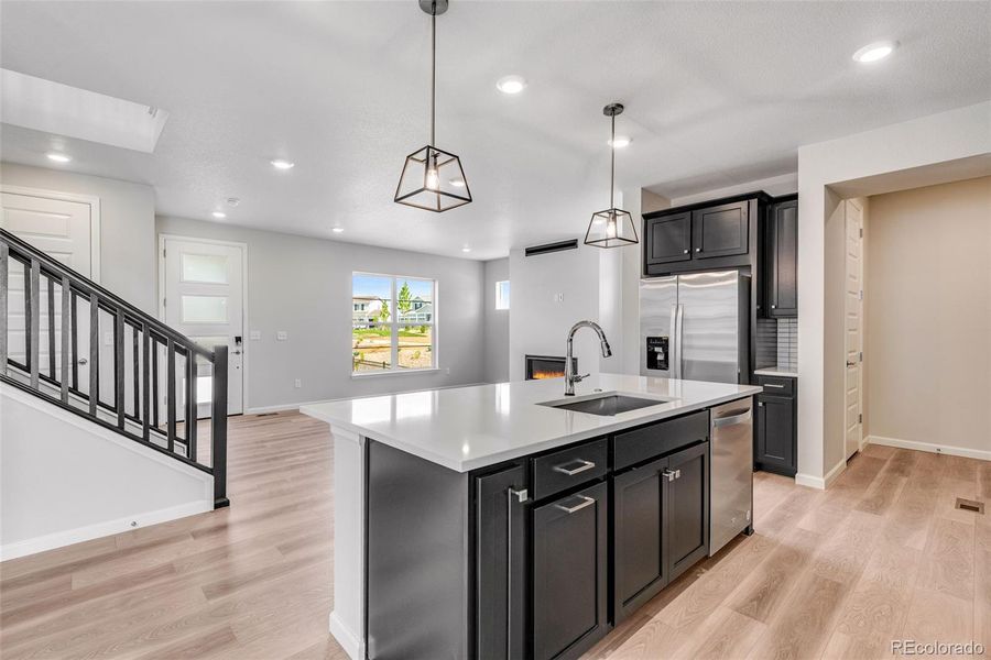 Furnished interior view inside a new home in Crescendo at The Aurora Highlands, Aurora (Image 13).