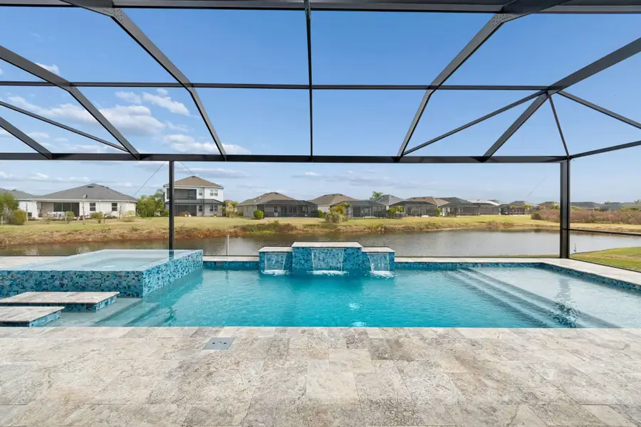Exterior details and patio area of a home in River Preserve Estates, Parrish (Image 4).