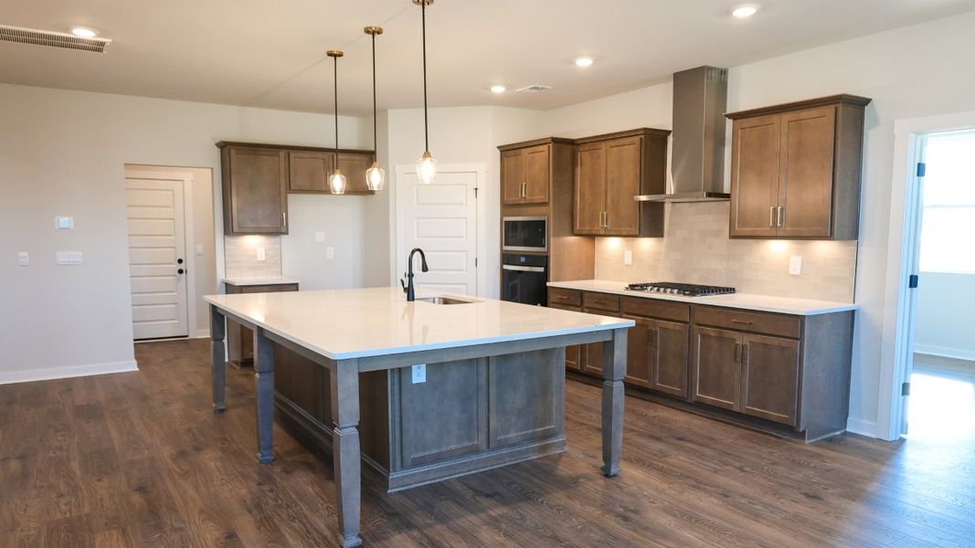 Representative furnished interior of a home built from the TISDALE by D.R. Horton in Harvest Point, Spring Hill (Image 11).