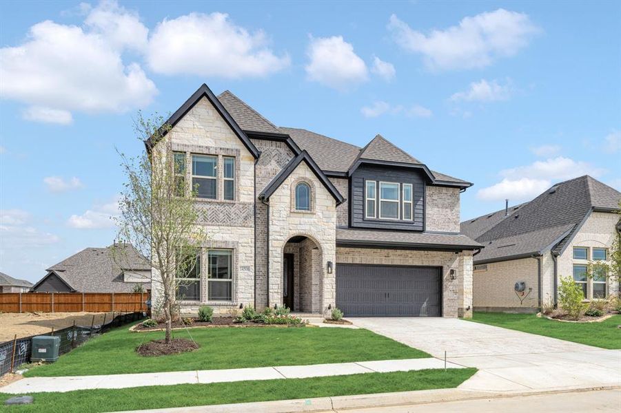 Front exterior of a new home in Creekview Meadows, Pilot Point, TX, highlighting curb appeal (Image 2). Front exterior of a new home in Creekview Meadows, Pilot Point, TX, highlighting curb appeal (Image 2).