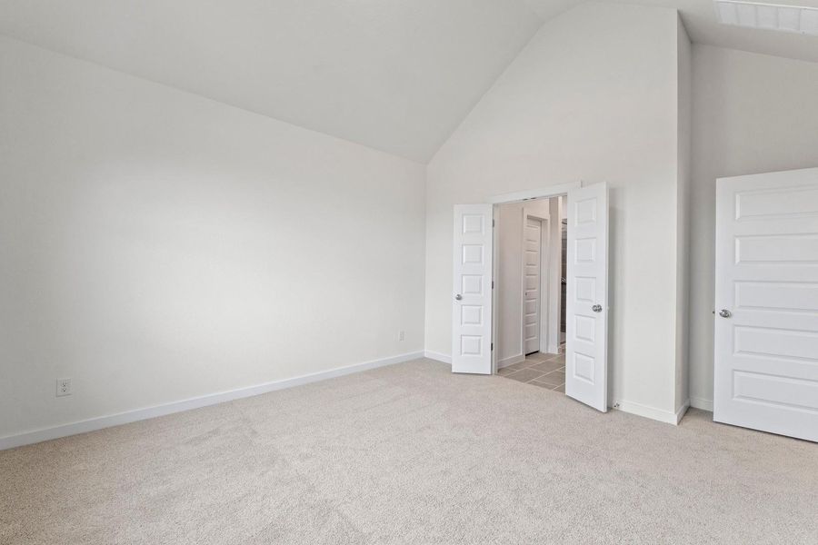 Primary Bedroom in the Pearl home plan by Trophy Signature Homes – REPRESENTATIVE PHOTO Primary Bedroom in the Pearl home plan by Trophy Signature Homes – REPRESENTATIVE PHOTO