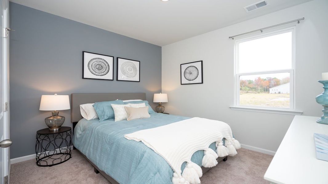 Representative furnished interior of a home built from the KERRY by D.R. Horton in Lochaven, Conway (Image 10).